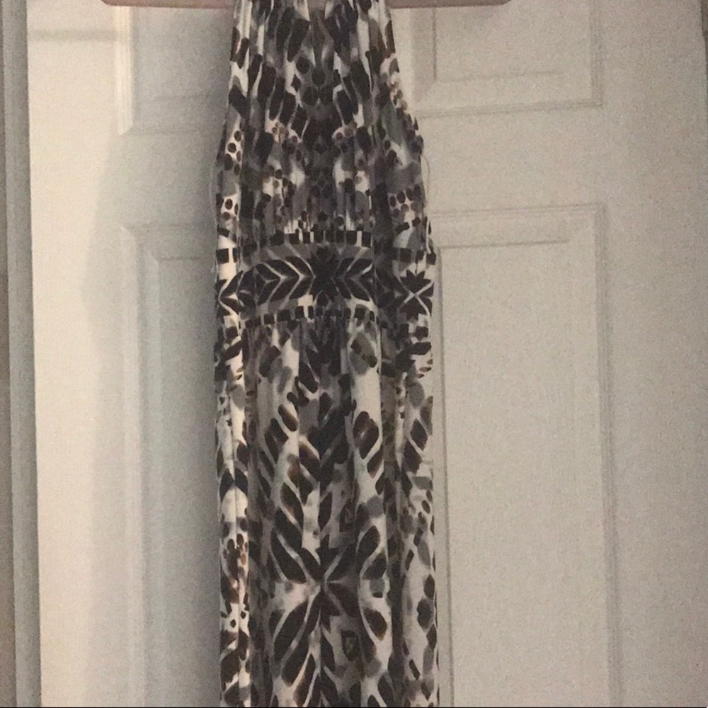 Long dress color are brown gray and white